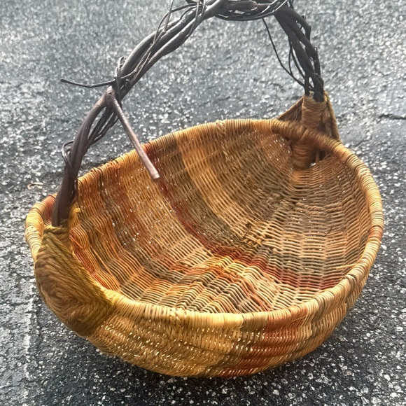 Vintage gathering multi colored butt basket with Grape vine handle